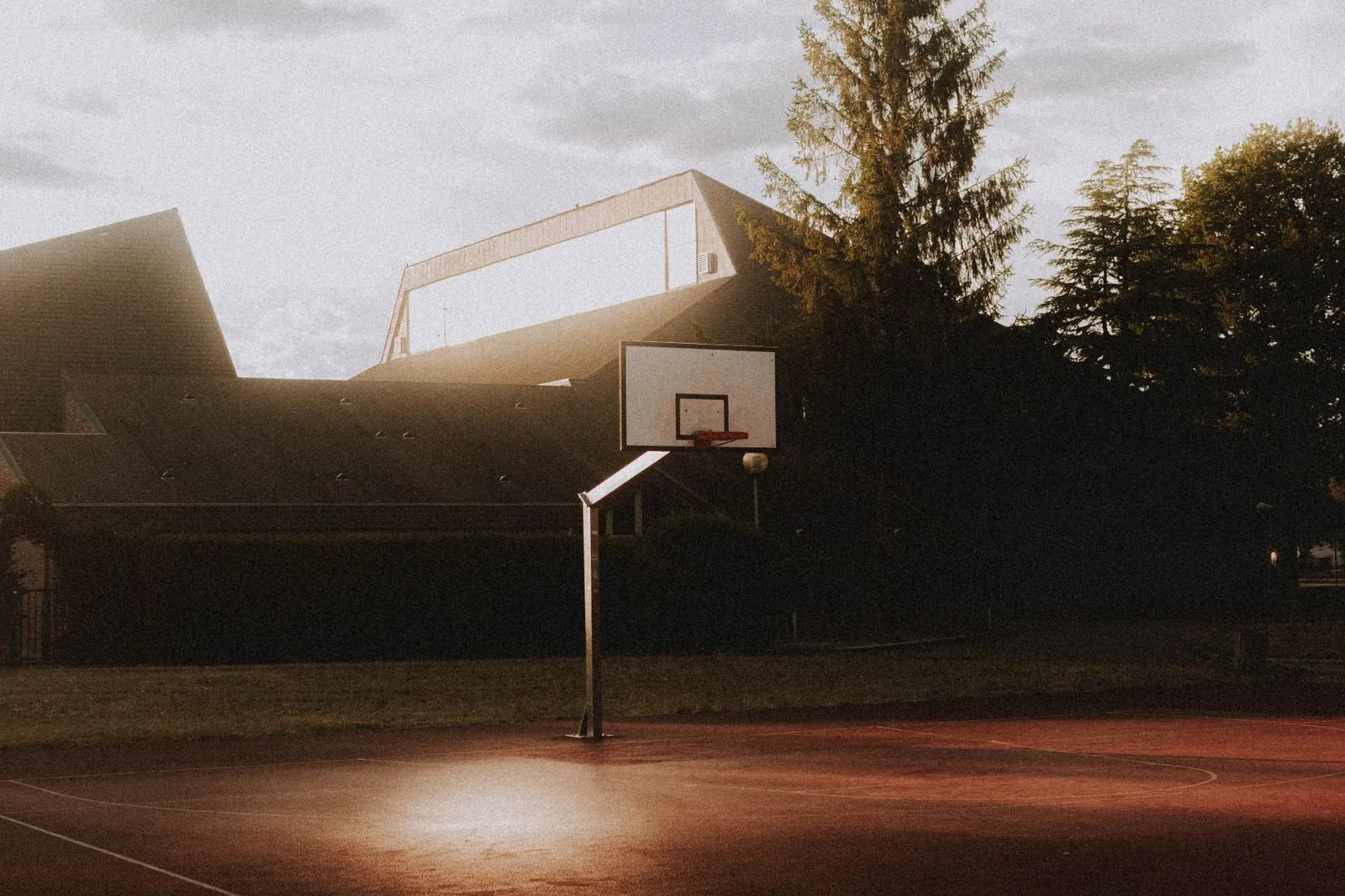 Basketball hoop on an outdoor sports ground