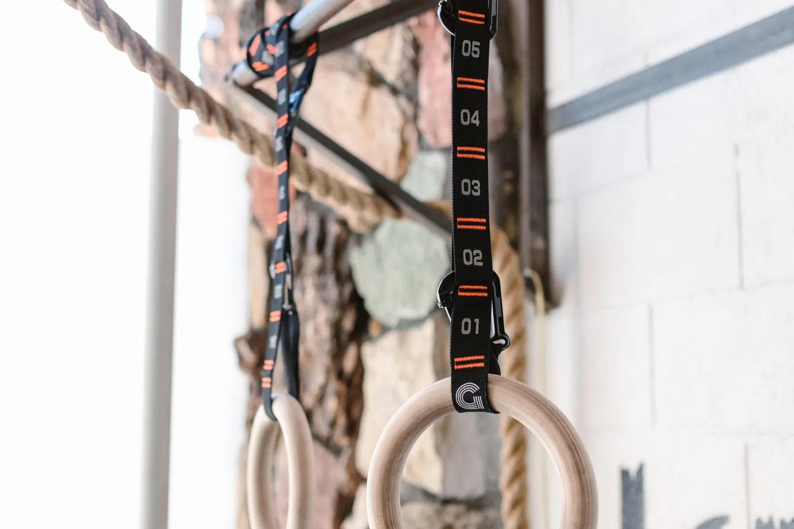 Wooden gymnastic rings hanging indoors